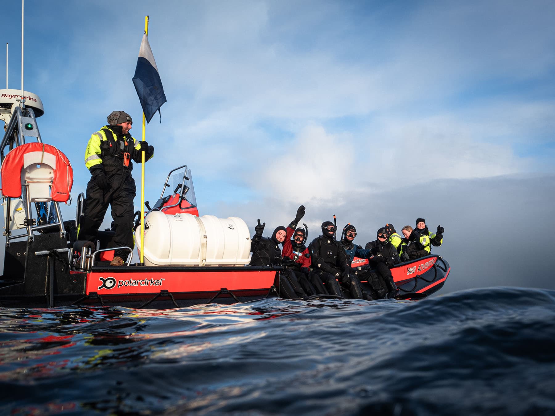 Happy snorkelers on a dinghy